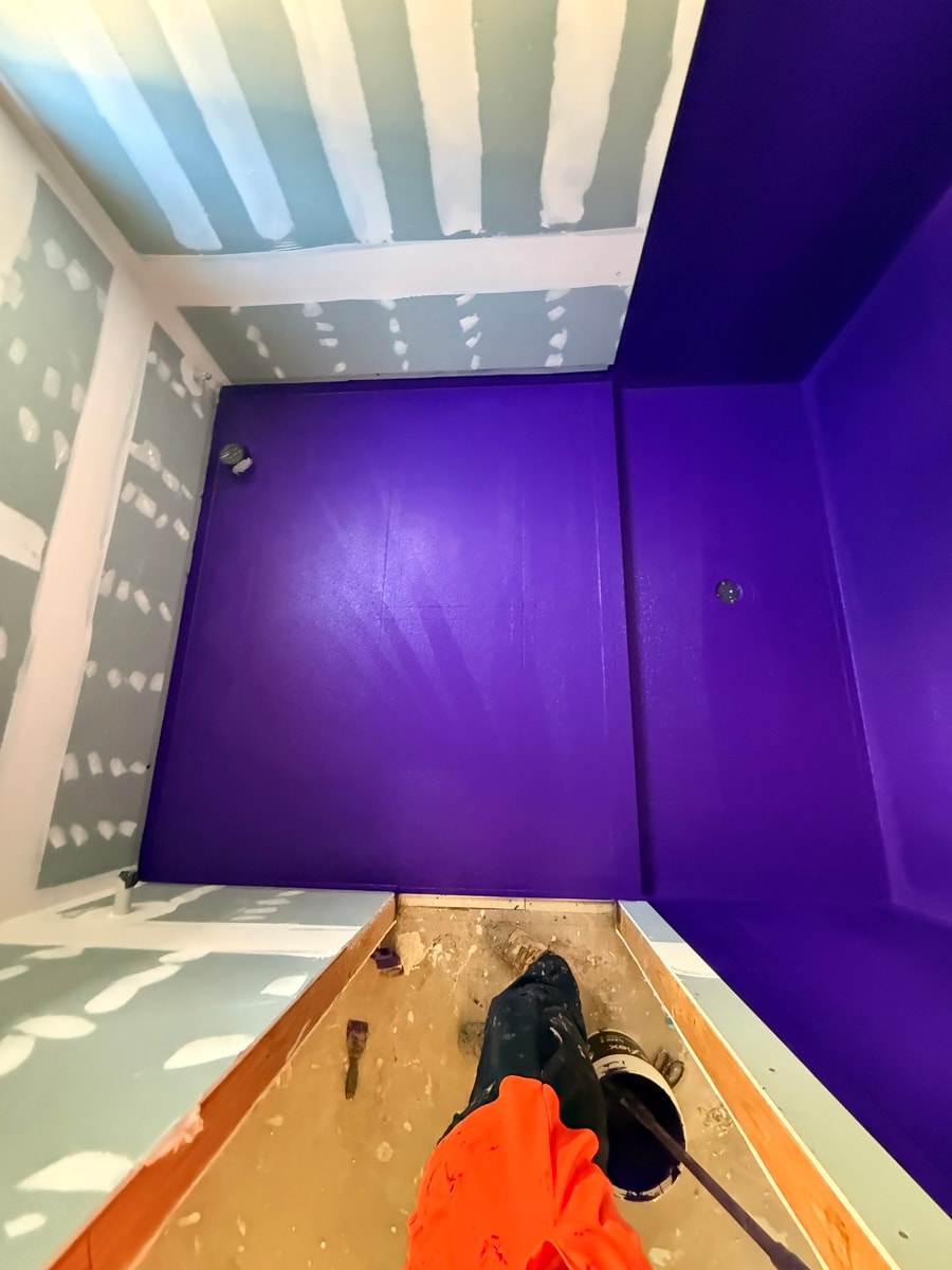 Waterproofing work in progress — wet area membrane application